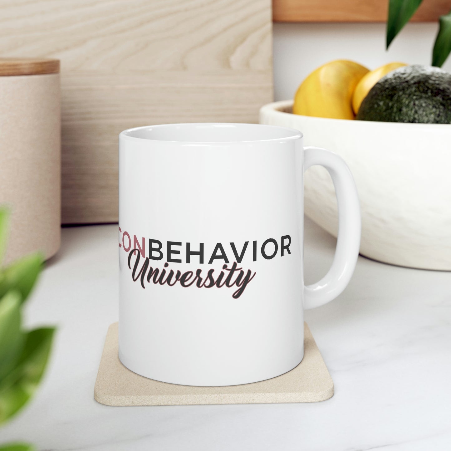 Icon Behavior University Signature Mug sitting on kitchen counter 