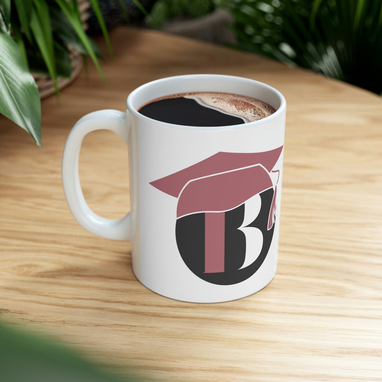 Icon Behavior University Logo Mug with hot coffee 