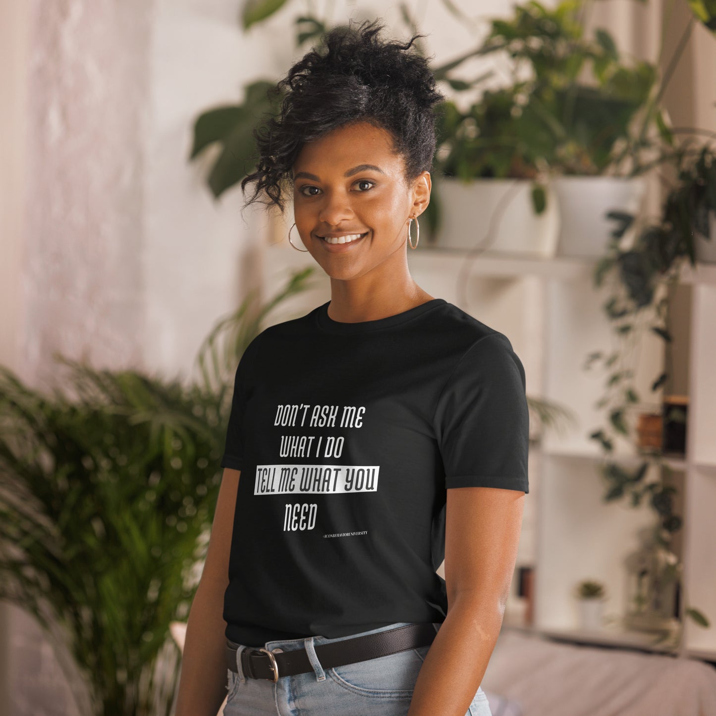 Girl Boos in black t-shirt that says "Don't Ask Me What I Do Tell Me What You Need"